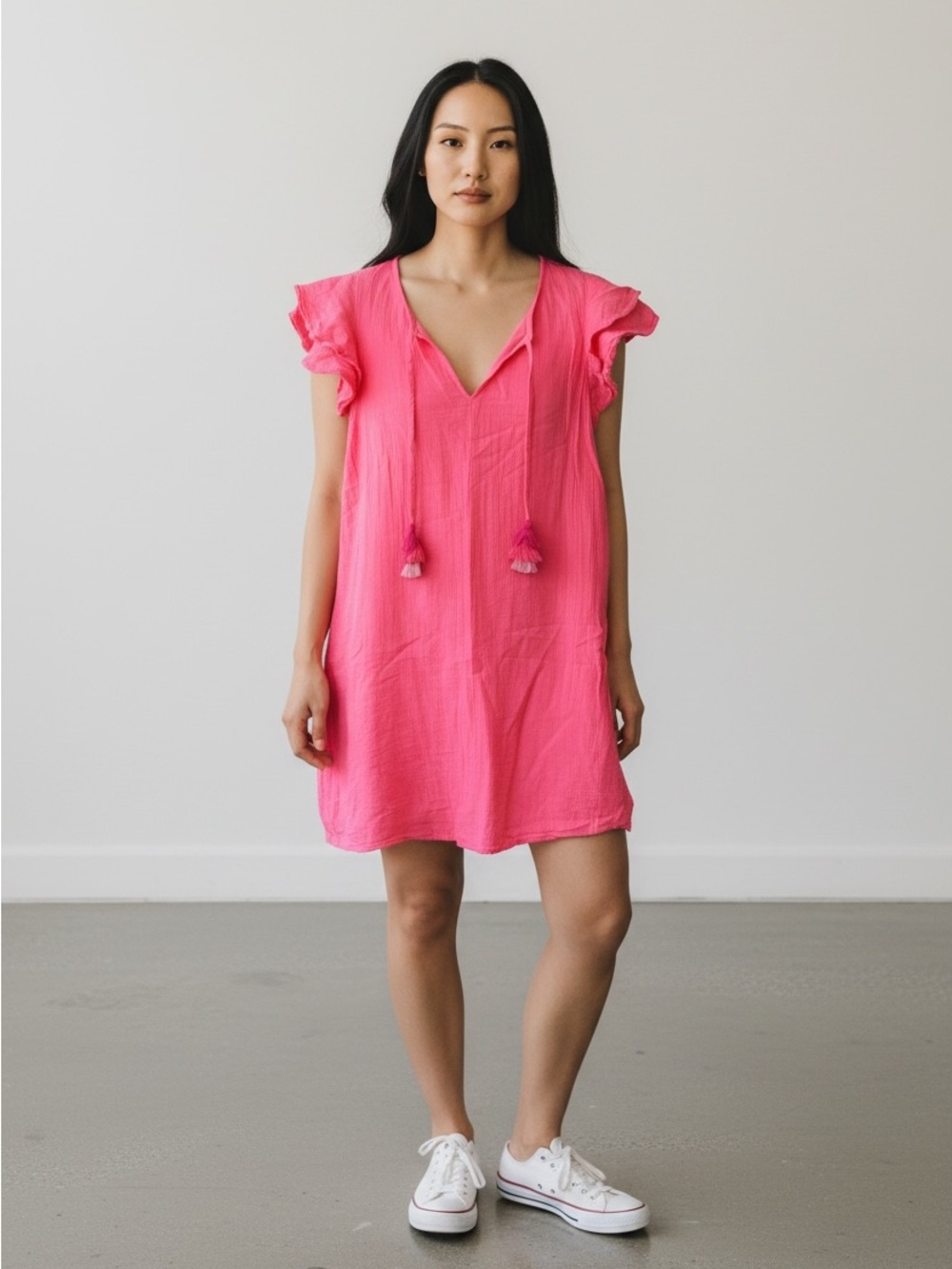 Vineyard Vines tassel dress with lightweight crinkled fabric and ruffle sleeves.